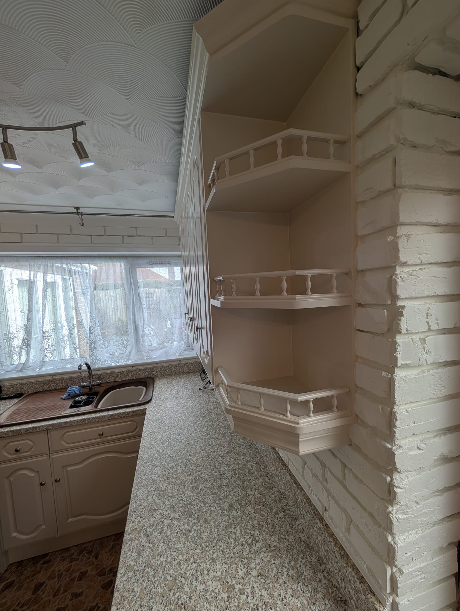 Cream kitchen with shelving Norwich