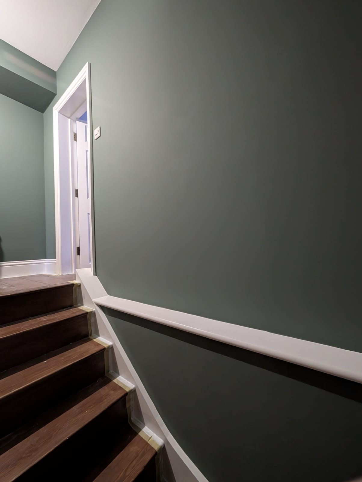 Staircase painting dark green Norwich